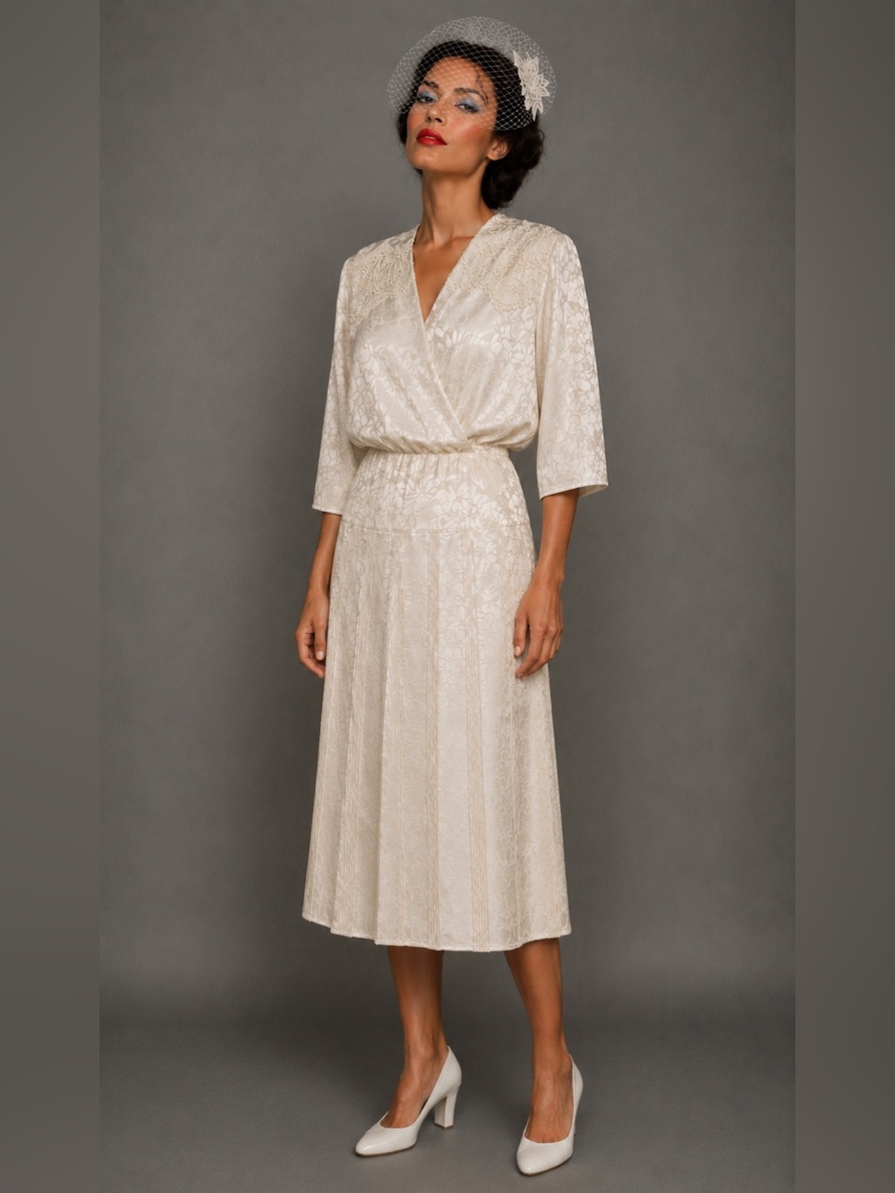80s white silky blousey dress.  Shoulder pads, lace, small pleats, size small.